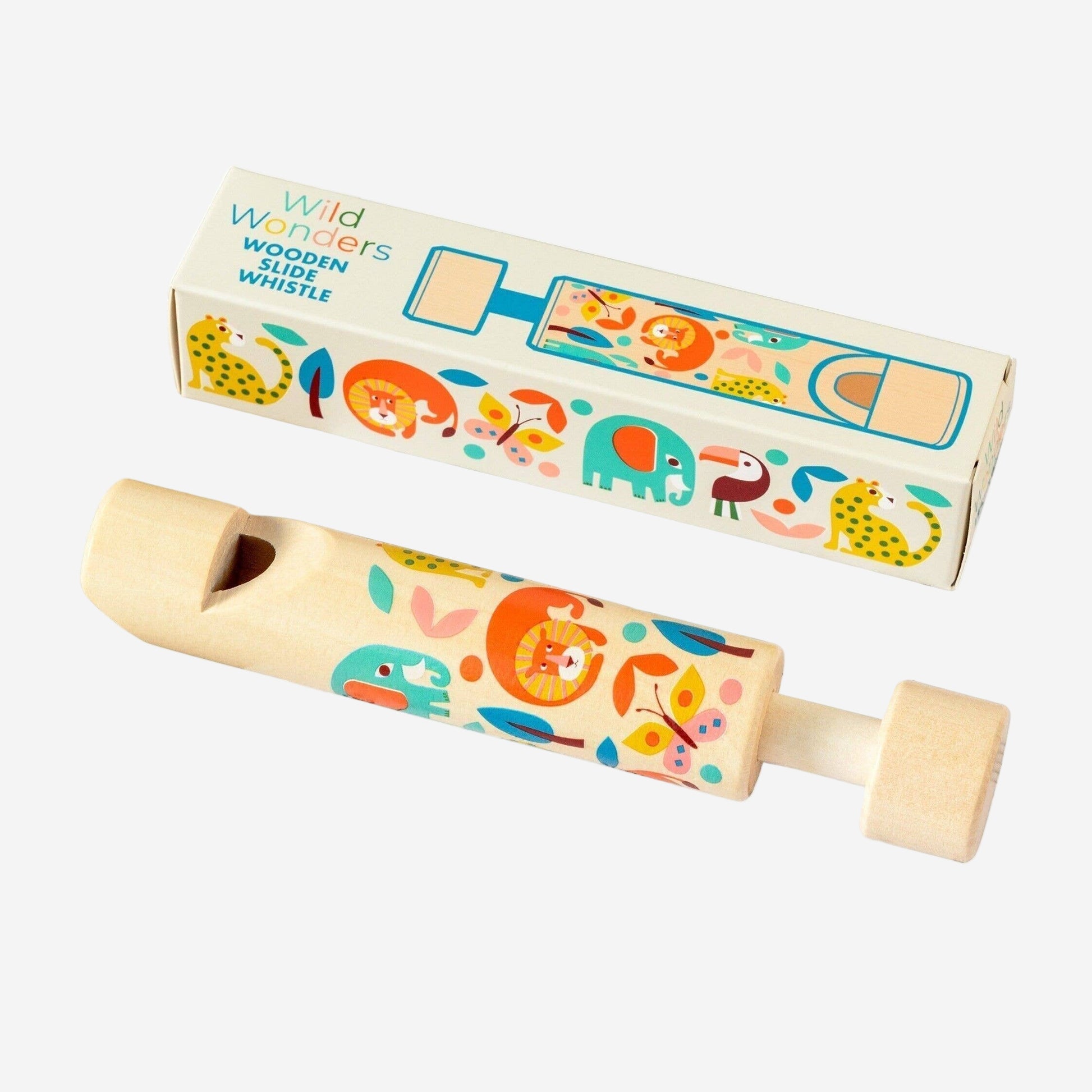 Wooden toy whistle with colorful animal designs next to its packaging on a white background