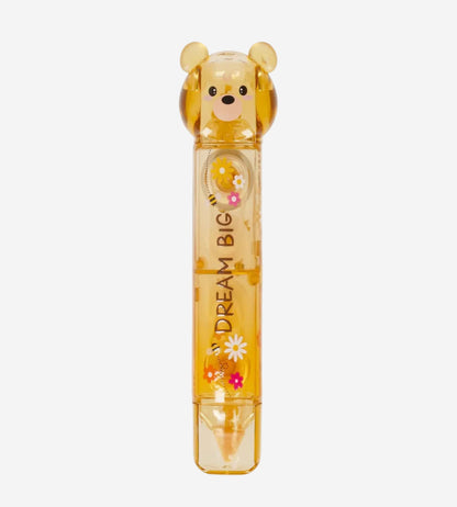 Yellow bear-shaped container with 'Dream Big' text on a white background