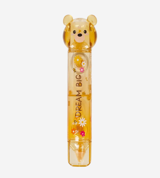 Yellow bear-shaped container with 'Dream Big' text on a white background