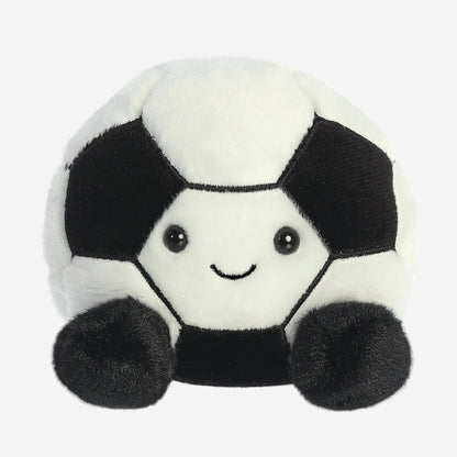 A cute plush soccer ball toy with a smiling face, photographed on a solid white background.