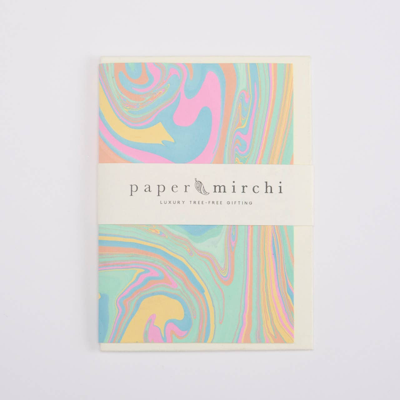 Pack of paper with colorful swirl design on a white background, branded 'paper mirchi'.