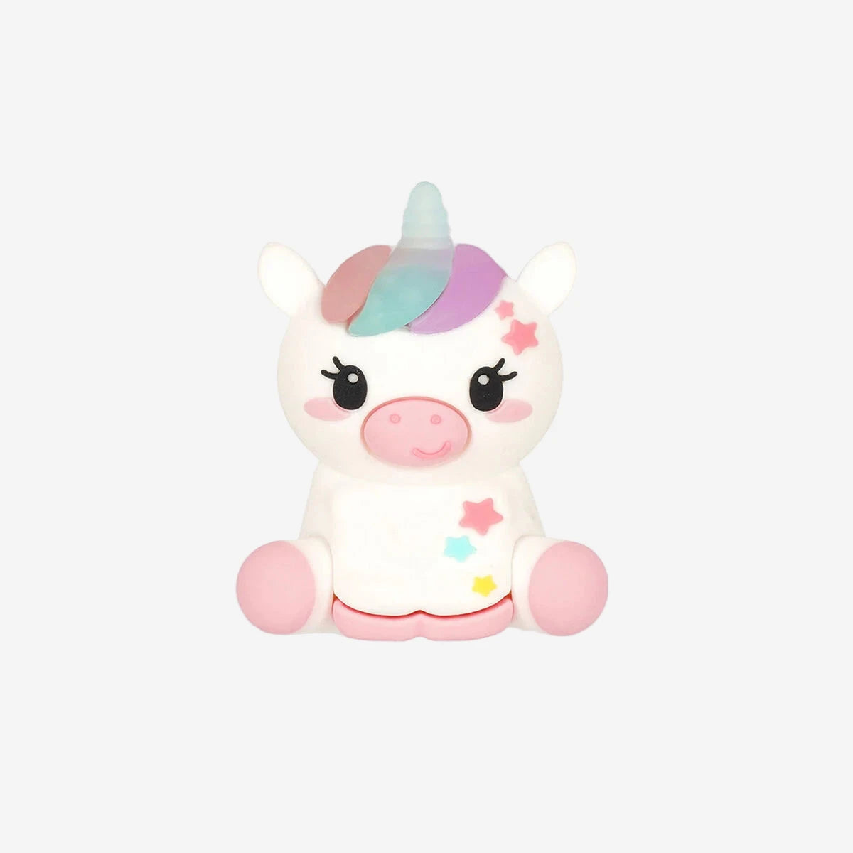 Plush unicorn toy with a colorful horn on a white background