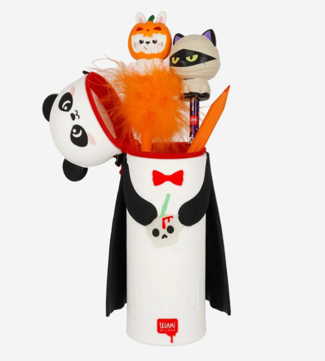 A Halloween-themed pen holder set by Team11, featuring a white cylindrical cup decorated with a vampire design, holding orange pens and a fluffy orange feather. A plush panda head peeks out from the left, and two cat figurines dressed as a mummy and a pumpkin sit on top, all on a clean white background.