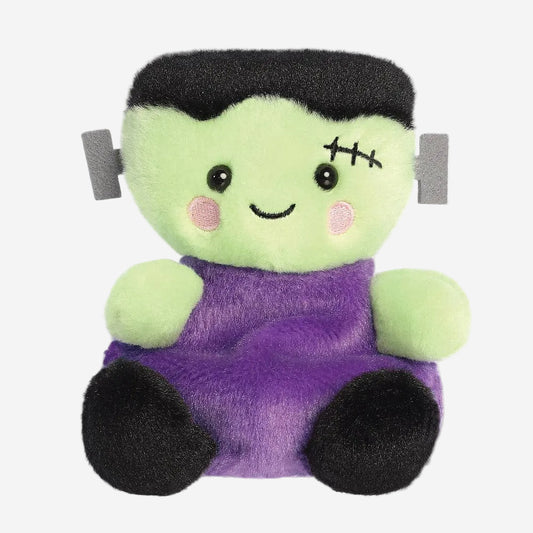 Plush toy resembling a cartoonish Frankenstein monster on a white background