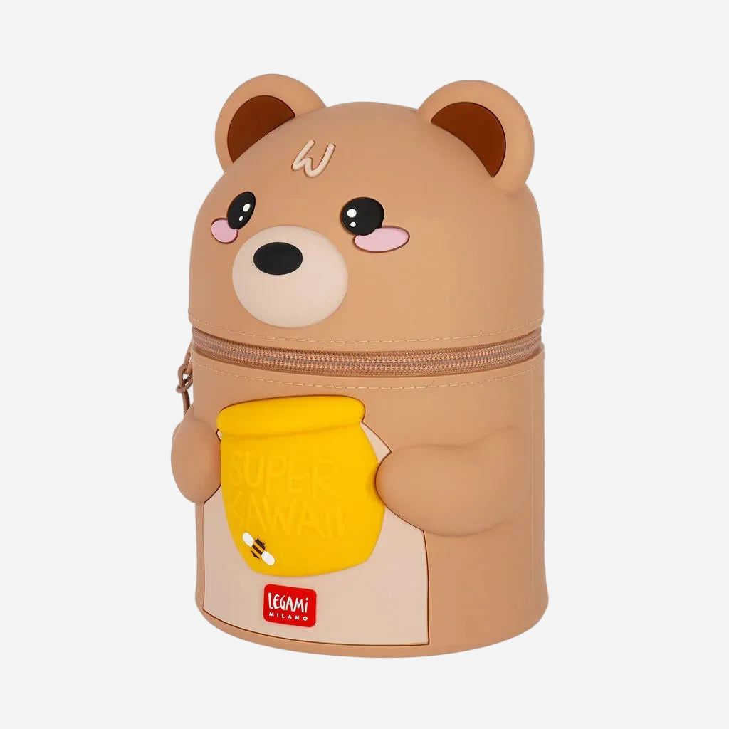 A cute teddy bear-shaped zipper pouch by Legami Design, featuring a light brown body, a yellow honey pot detail on the front, and a small red brand logo at the bottom.