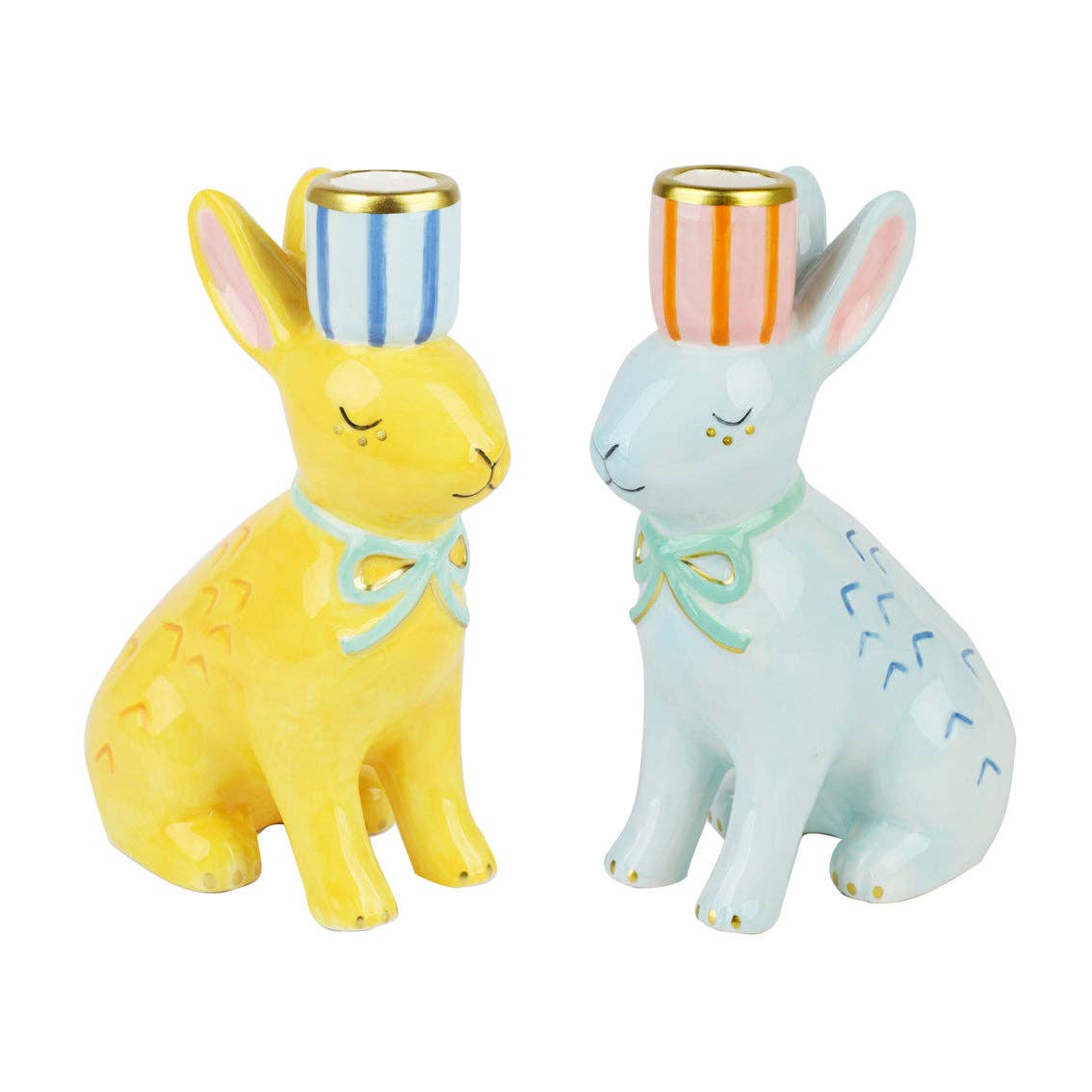 Two ceramic rabbit-shaped candle holders, one yellow and one white, on a white background.