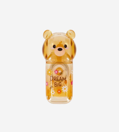 Teddy bear-shaped container with 'Dream Big' text on a white background