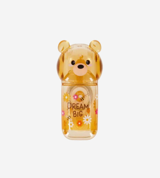 Teddy bear-shaped container with 'Dream Big' text on a white background