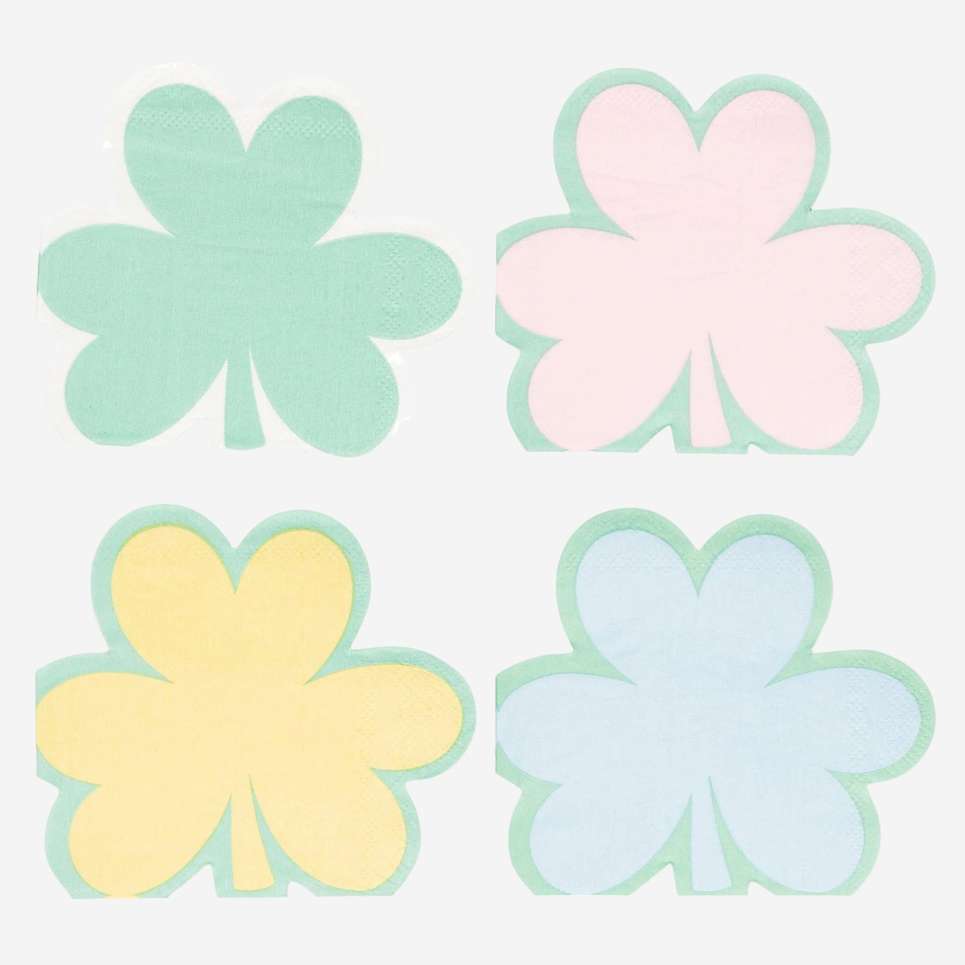 Four pastel-colored four-leaf clover stickers on a white background