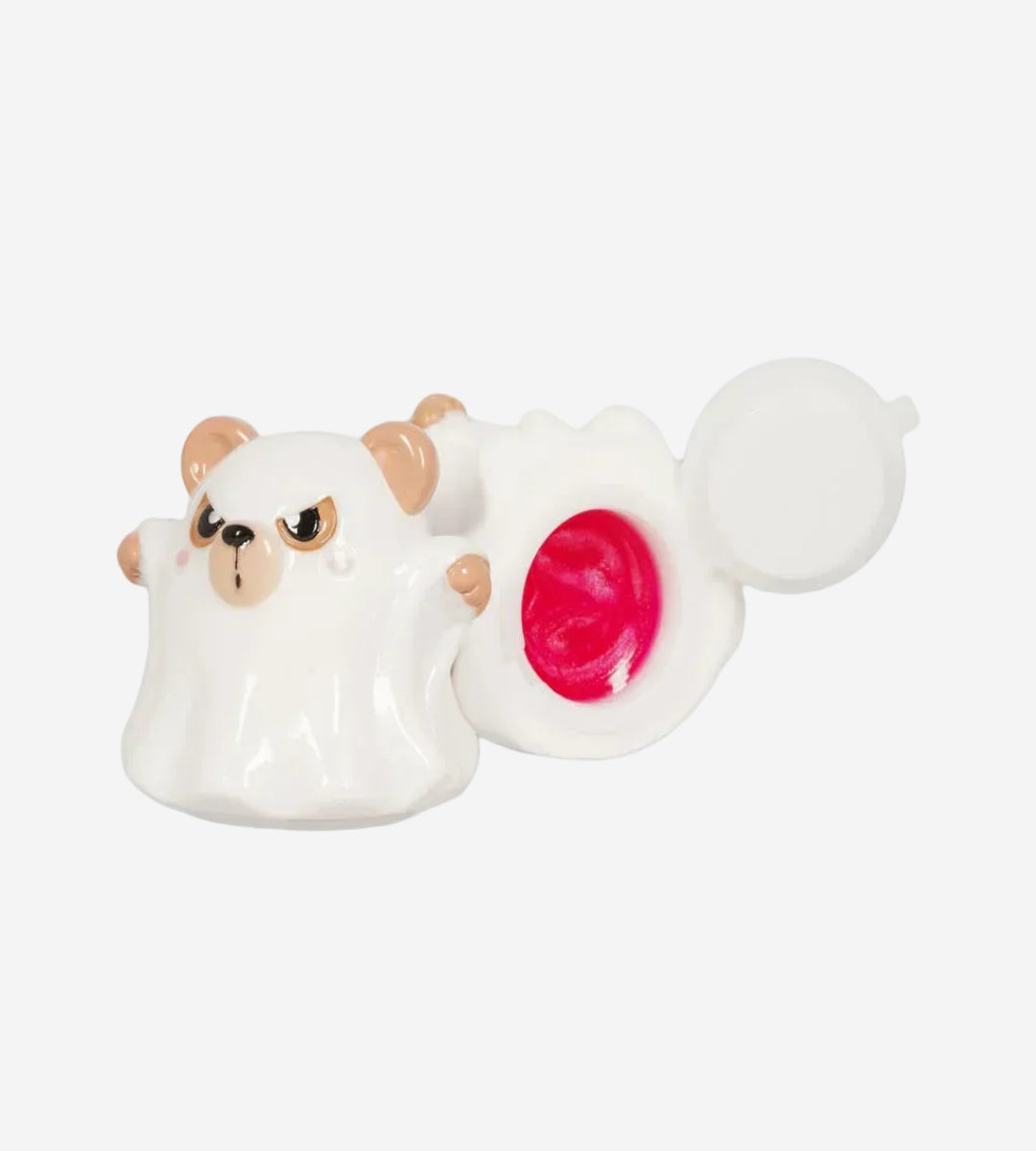 A white novelty lip balm container shaped like a cartoon bear face, with the lid off to reveal a bright pink balm inside, on a plain white background.