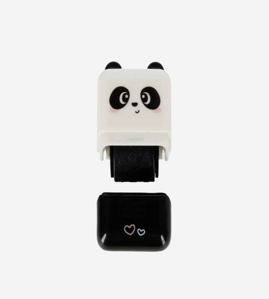 Panda-shaped black and white device on a white background