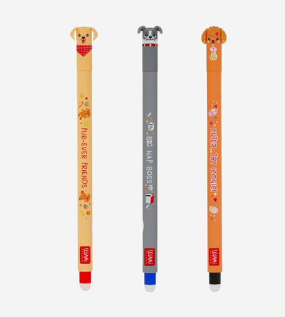 Three dog-themed mechanical pencils on a light gray background. The left pencil is beige with a dog head topper, red text reading 'RIP-ER-BOYS', and a red grip at the bottom.