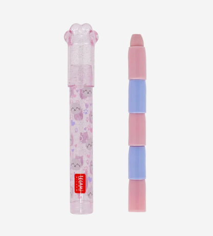 Pink and blue stationery item with a floral design on the packaging against a white background