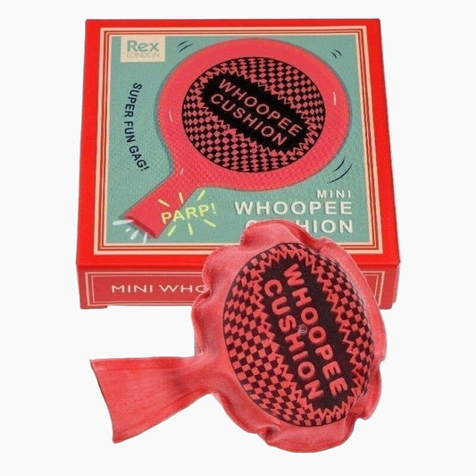 Mini whoopee cushion with packaging featuring the brand 'Rex'.